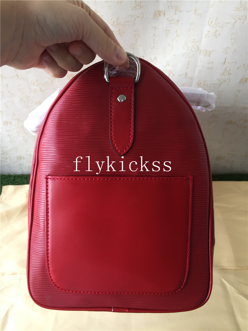 Supreme LVS Traveling Red Duffle Bag